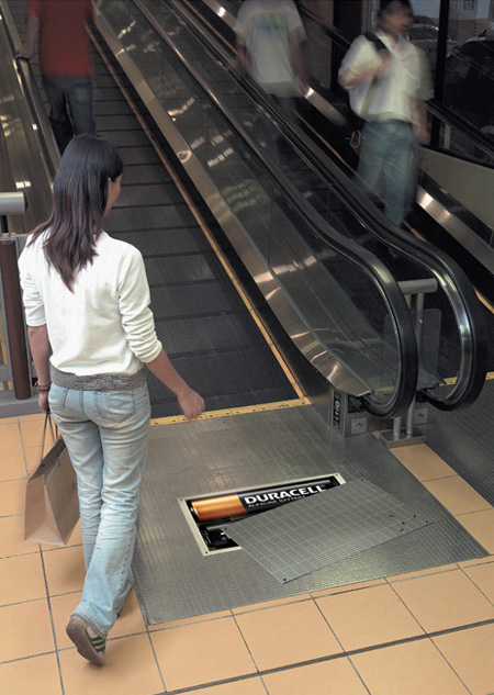 Duracell Escalator Advertisement Stickers of half covered Duracell battery