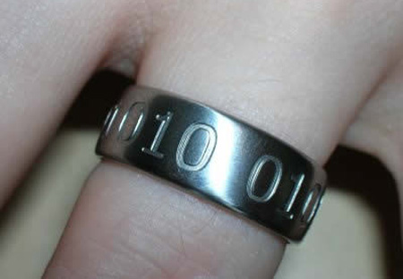 Custom made binary wedding ring The inscription reads 01001010 01010011