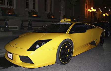 Yellow Lamborghini Murcielago taxi spotted in front of Fairmont Palliser 