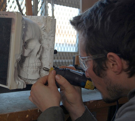 Skull Carved into Books