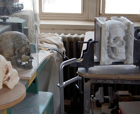 Human Skull Carved into Books