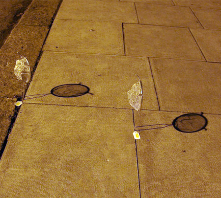 Shadow Faces by Isaac Cordal