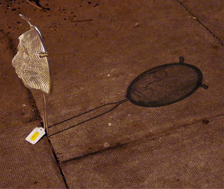 Shadow Face by Isaac Cordal