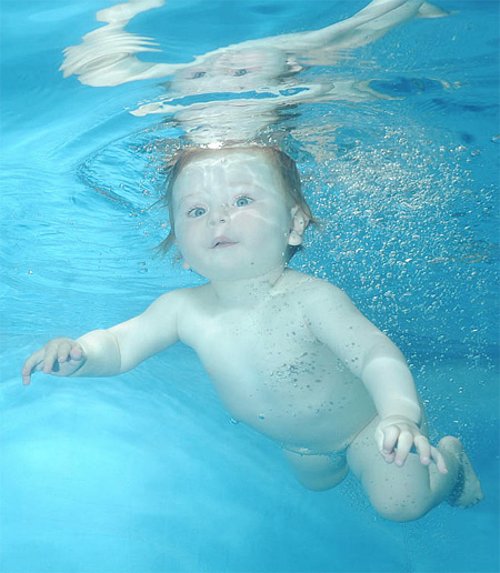 Baby Learning How to Swim
