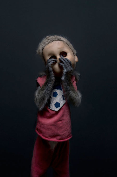 Photos of Monkeys Wearing Doll Masks