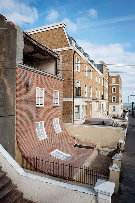 Alex Chinneck Sliding Building