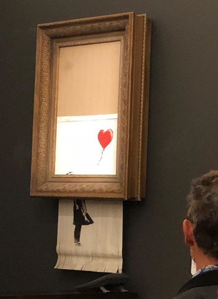 Banksy Painting Self-Destructs