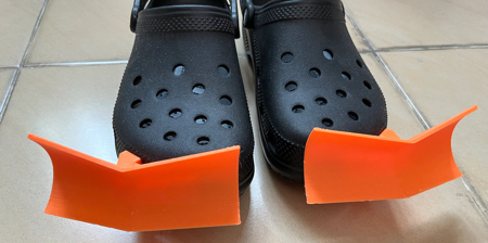 These Croc Snow Plow Attachments Help You Wear Your Crocs Through The Winter