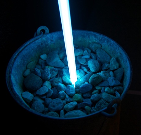 Neon Light pouring into a Bucket