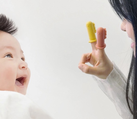 The Dino Finger Toothbrush